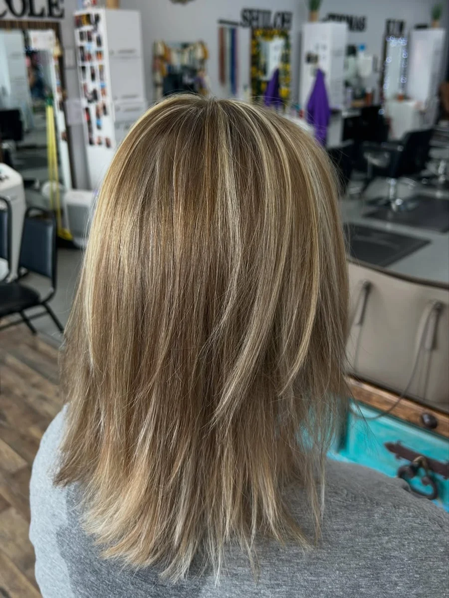Blonde highlights photographed inside KC's QuicKuts