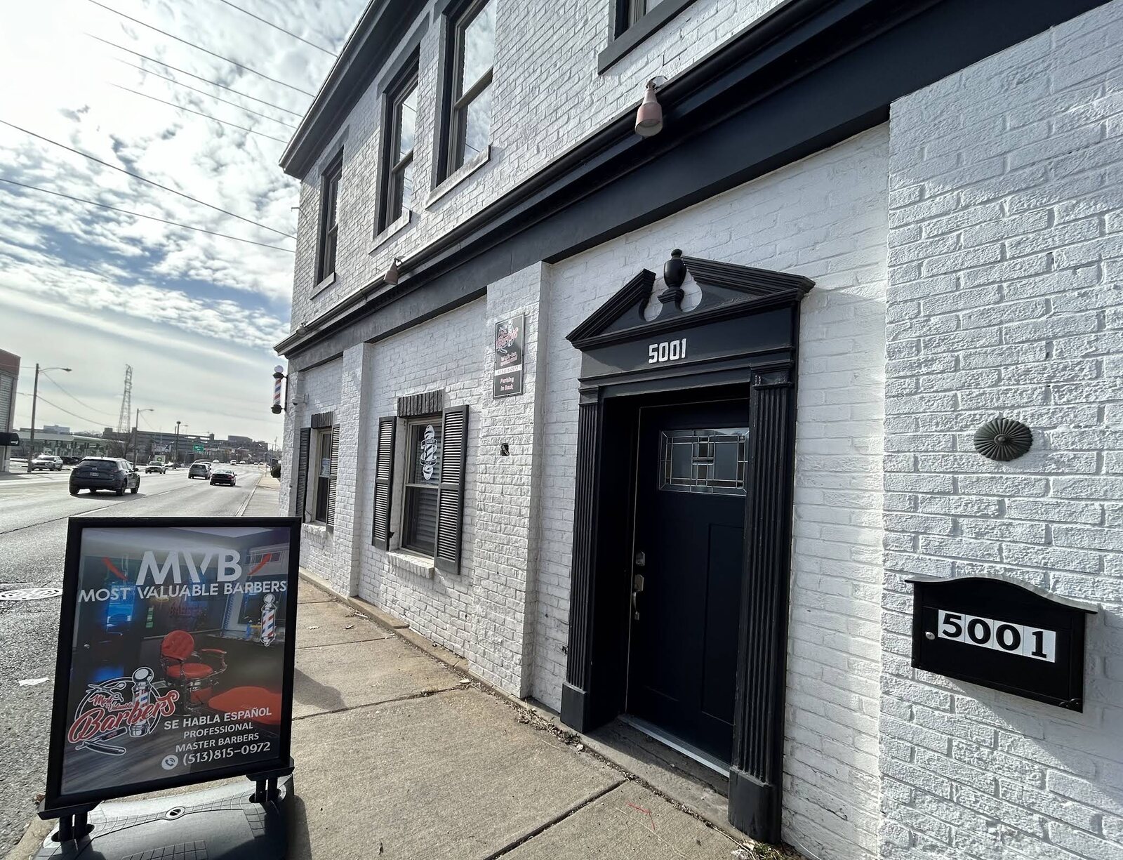 MVB storefront, number 5001 and sidewalk sign on Montgomery Road