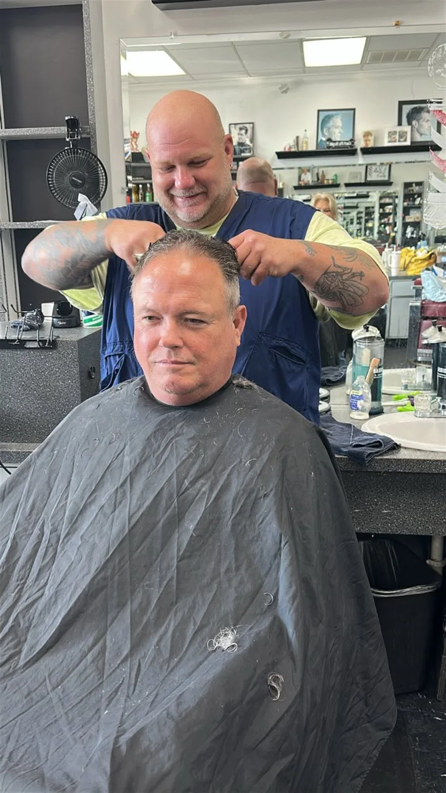 Adult client receiving a haircut at Temple's Barber & Style