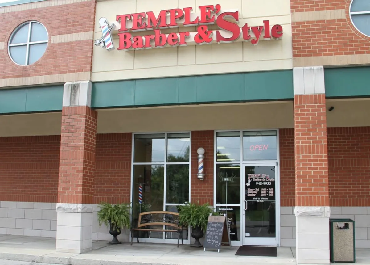 Signed Temple's Barber & Style storefront in Clarksville