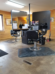 Barber chairs inside The Buzz Haircuts For Men